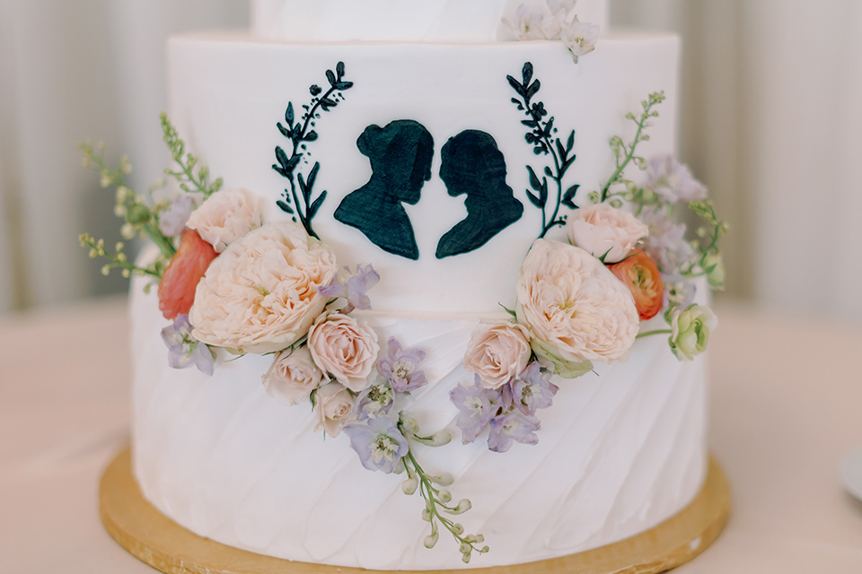  a Bridgerton inspired wedding with grand florals and dainty details – cake 