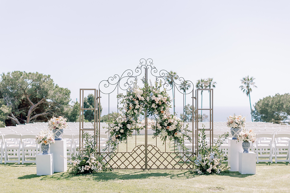  a Bridgerton inspired wedding with grand florals and dainty details – ceremony decor 