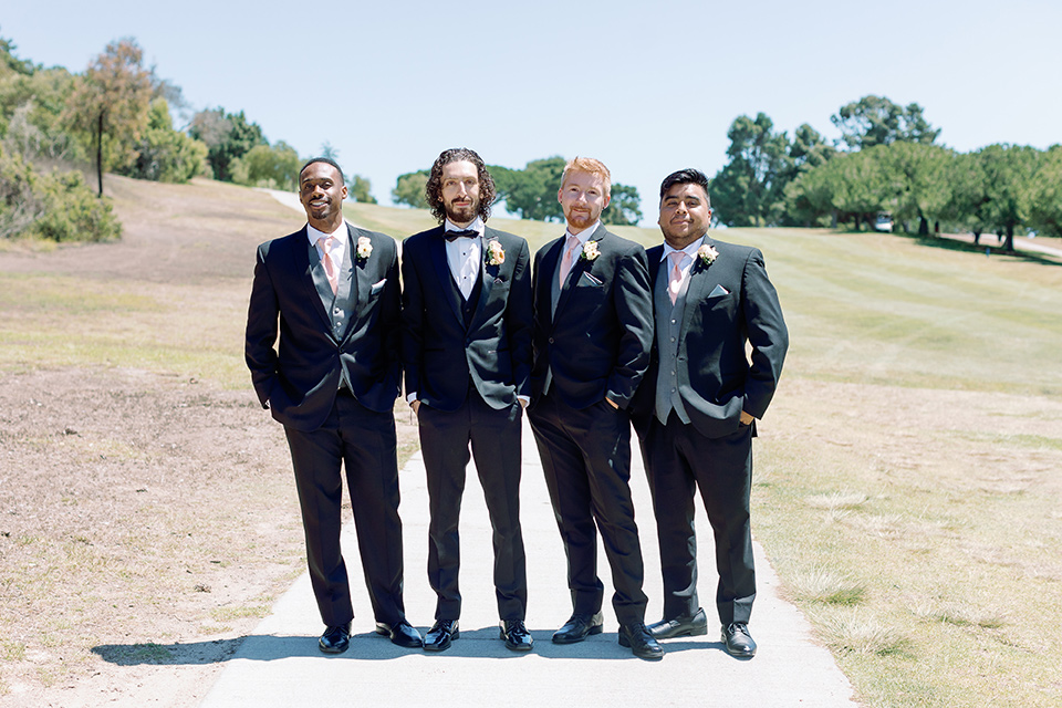  a Bridgerton inspired wedding with grand florals and dainty details – groomsmen 
