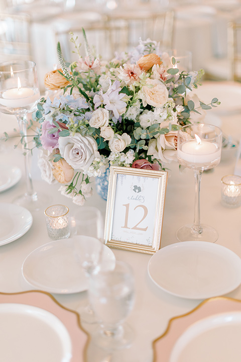  a Bridgerton inspired wedding with grand florals and dainty details - reception décor 
