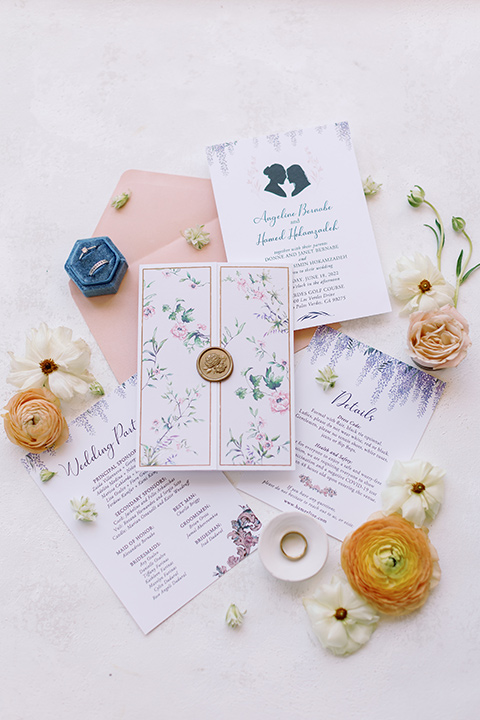  a Bridgerton inspired wedding with grand florals and dainty details - invitations 