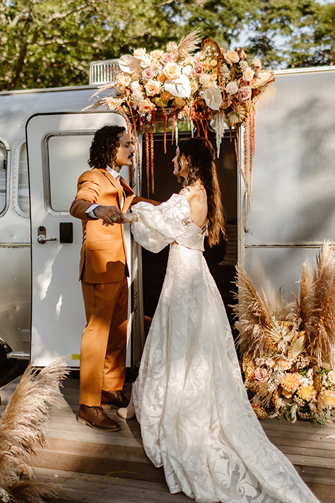  a boho caramel wedding inspo with an airstream and pampas grass – ceremony 