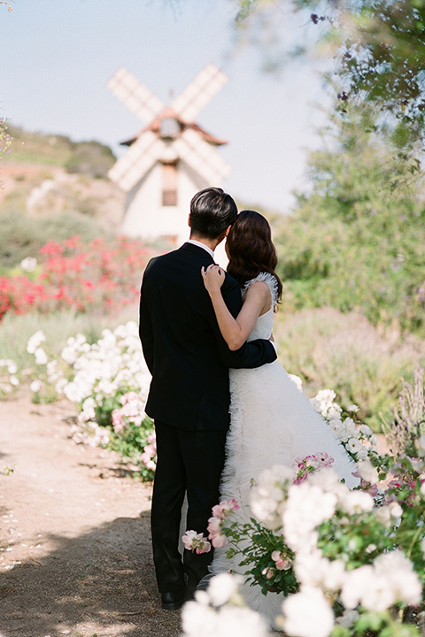  a European romantic wedding with an old world ethereal vibe – couple in the flowers 