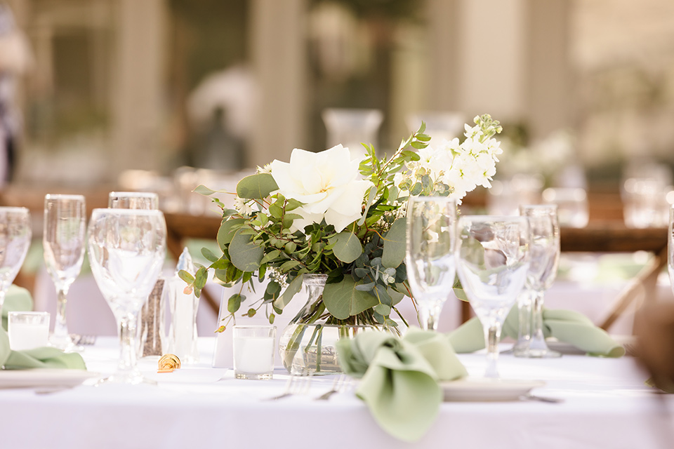  a romantic garden-rustic wedding with black and neutral décor elements and brick venue – table décor 