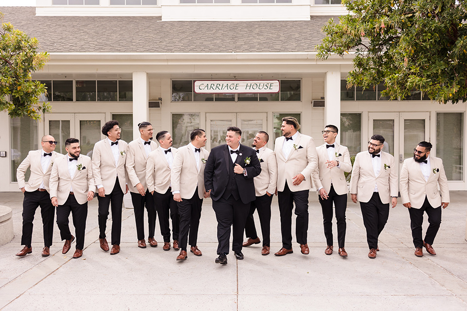  a romantic garden-rustic wedding with black and neutral décor elements and brick venue – groom + groomsmen 