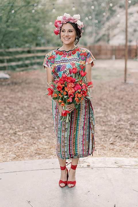  a wedding with central american cultural inspiration – bride in traditional colored dress 