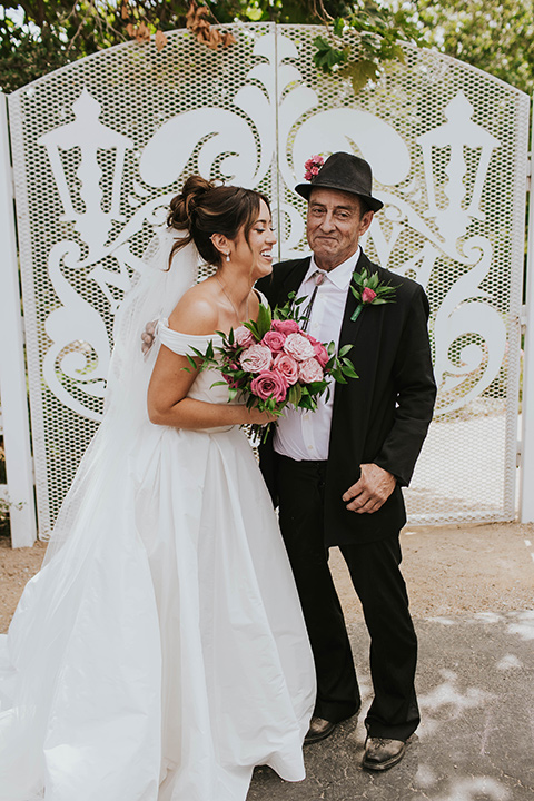  a grand pink and rose las vegas style wedding with bold trendy details – bride and her father 