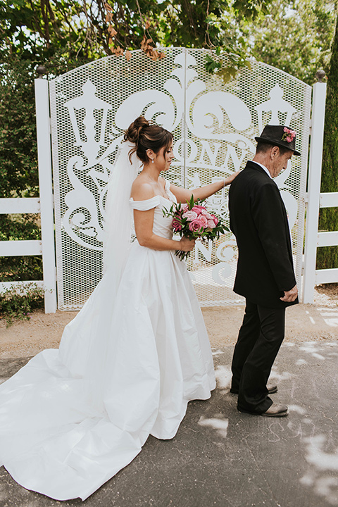  a grand pink and rose las vegas style wedding with bold trendy details – bride and her father 