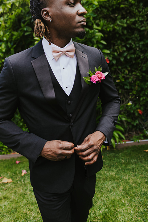  a grand pink and rose las vegas style wedding with bold trendy details – groom 
