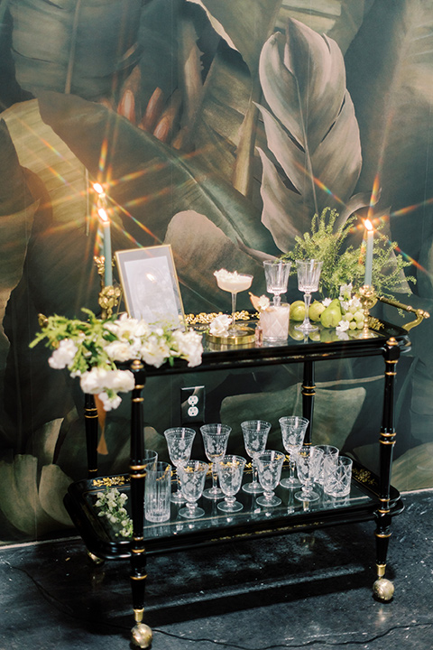 an old money luxury wedding vibe with green and black tones – bar cart 