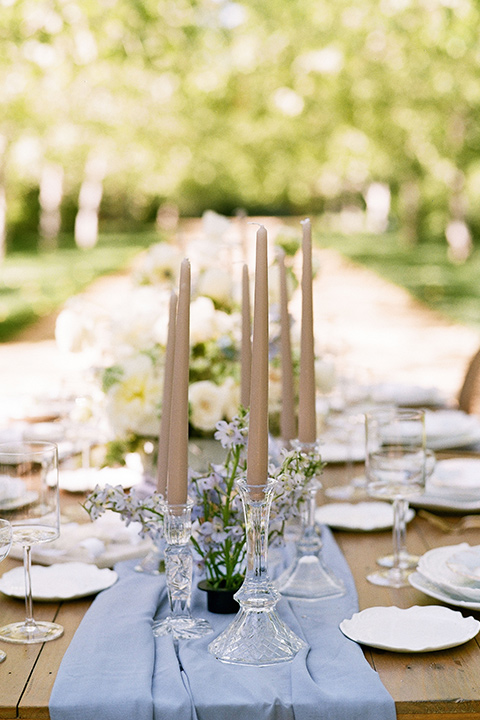  a dreamy garden wedding at Kestrel Park with the groom in a Navy Shawl tuxedo - table décor and set up 