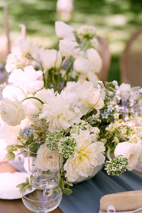  a dreamy garden wedding at Kestrel Park with the groom in a Navy Shawl tuxedo - menu and flowers 