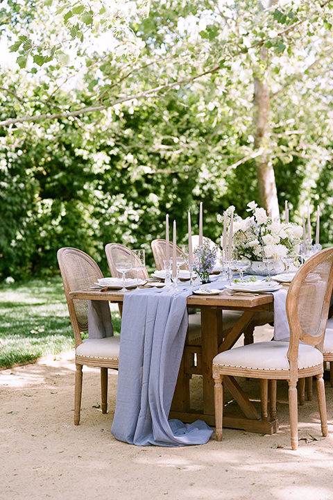  a dreamy garden wedding at Kestrel Park with the groom in a Navy Shawl tuxedo - table décor and set up 