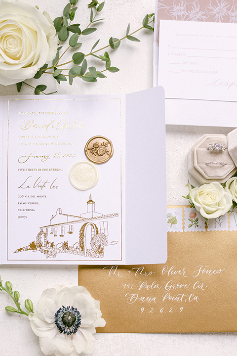  a monochromatic modern wedding at La Venta Inn with the bride in a sleek gown and the groom in a white tuxedo - invitations 