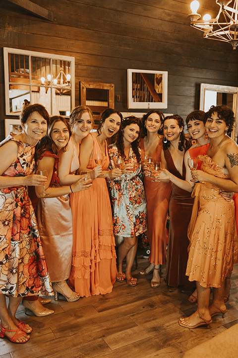  green and orange wedding in the woods with a rustic bohemian vibe – bridesmaids 
