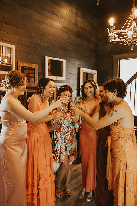  green and orange wedding in the woods with a rustic bohemian vibe – bridesmaids 