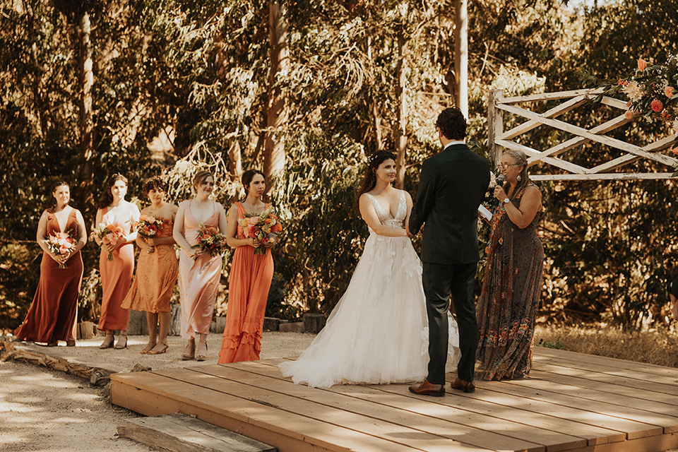  green and orange wedding in the woods with a rustic bohemian vibe – ceremony 