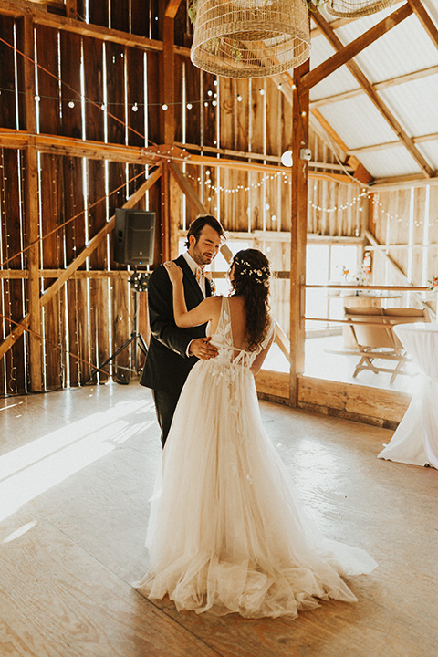  green and orange wedding in the woods with a rustic bohemian vibe – first dance 