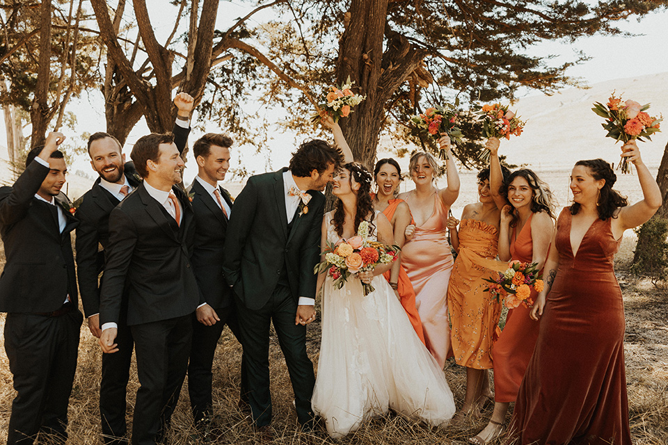  green and orange wedding in the woods with a rustic bohemian vibe – vow books 