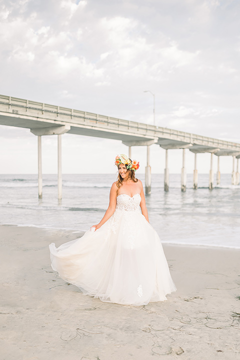  couple eloping on the beach with bright vibrant colors - bride 