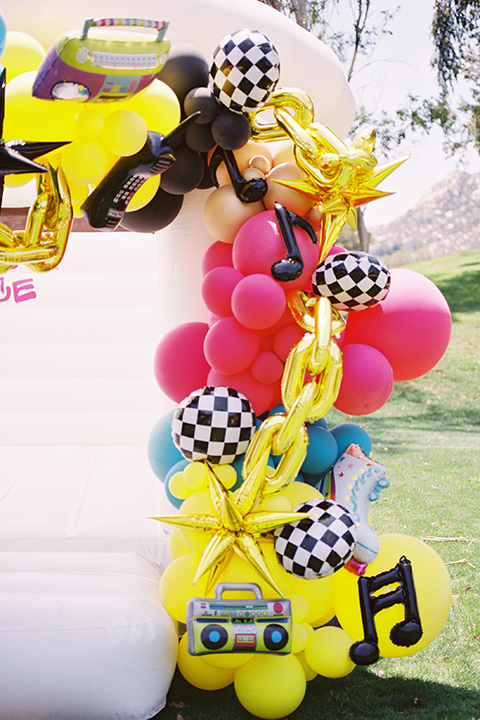  a colorful wedding in temecula with a 90s themed after party – bounce house 