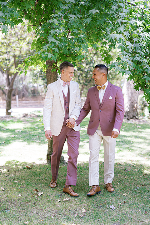  a colorful wedding in temecula with a 90s themed after party – couple walking 