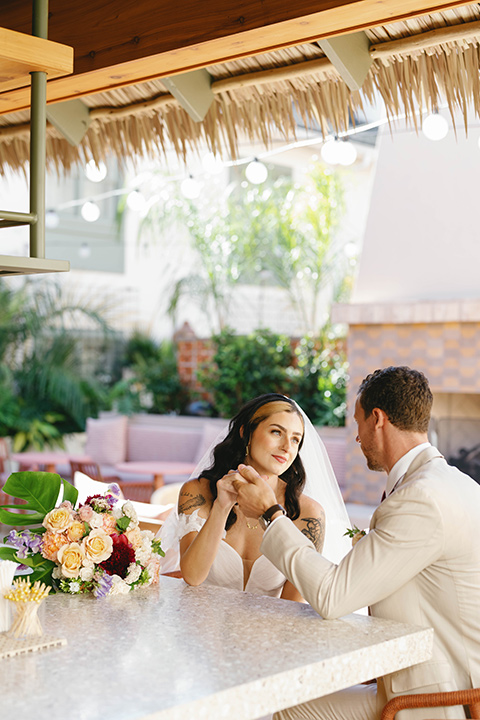  tropical and fun wedding at the Ryder Hotel – couple at the bar 