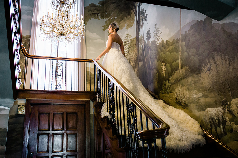  a dreamy whimsical wedding at a castle venue with the groom in a green velvet coat and the bride in a ballgown – bride 