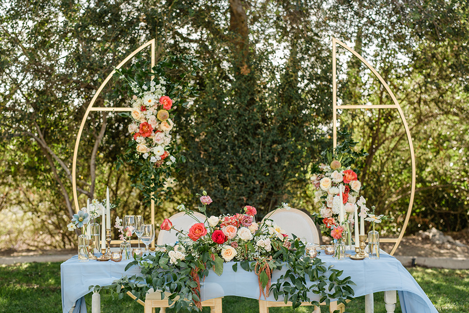 a dreamy whimsical wedding at a castle venue with the groom in a green velvet coat and the bride in a ballgown – sweetheart castle décor 