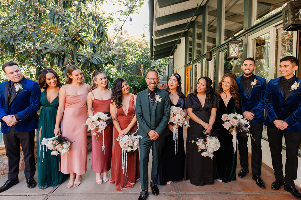  moody black and green wedding with neutral accents - wedding party 